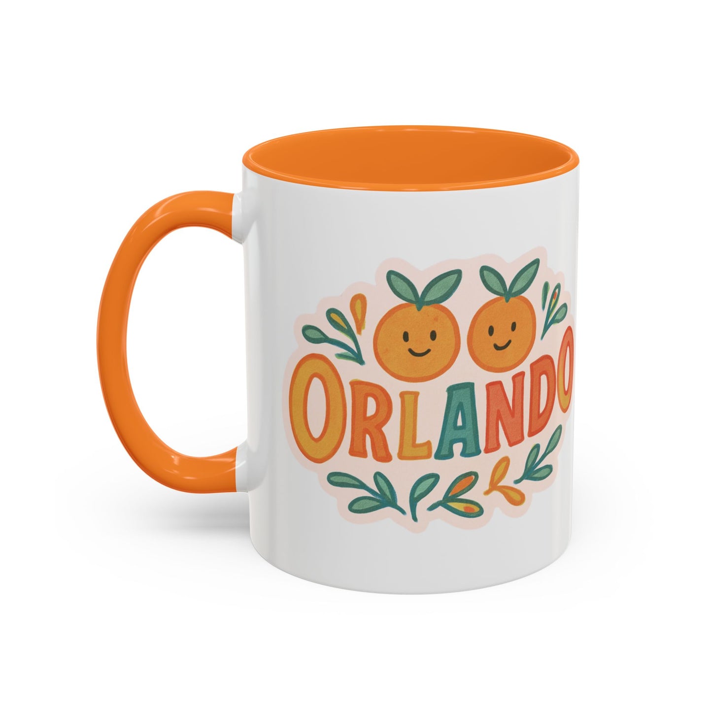 white ceramic mug with 'Orlando' written in orange lettering, accompanied by a graphic of orange and green leaves. The mug has an orange interior and handle.