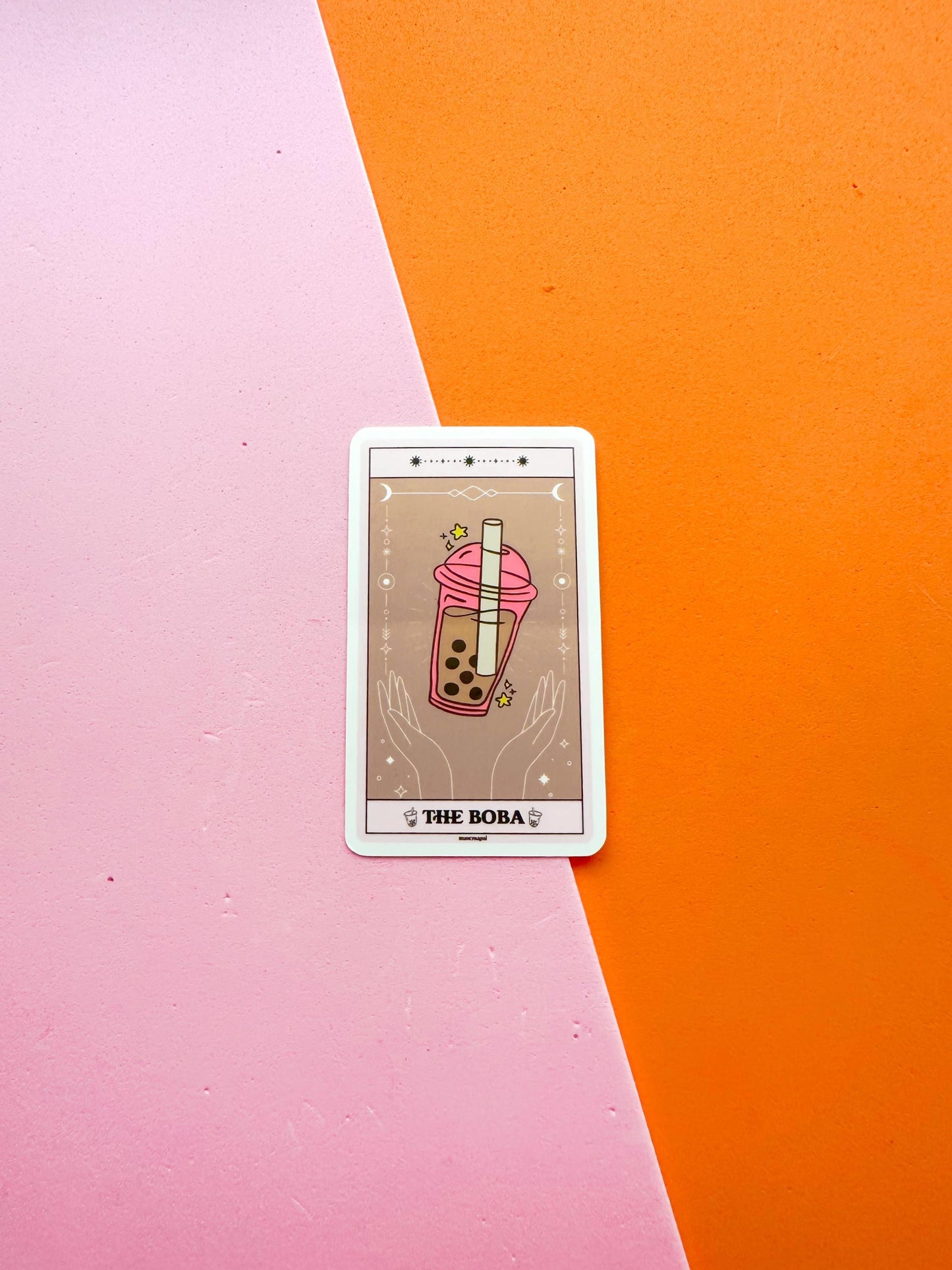 A vinyl sticker representing a tarot card with 'The Boba' title, featuring an illustration of a bubble tea cup,
