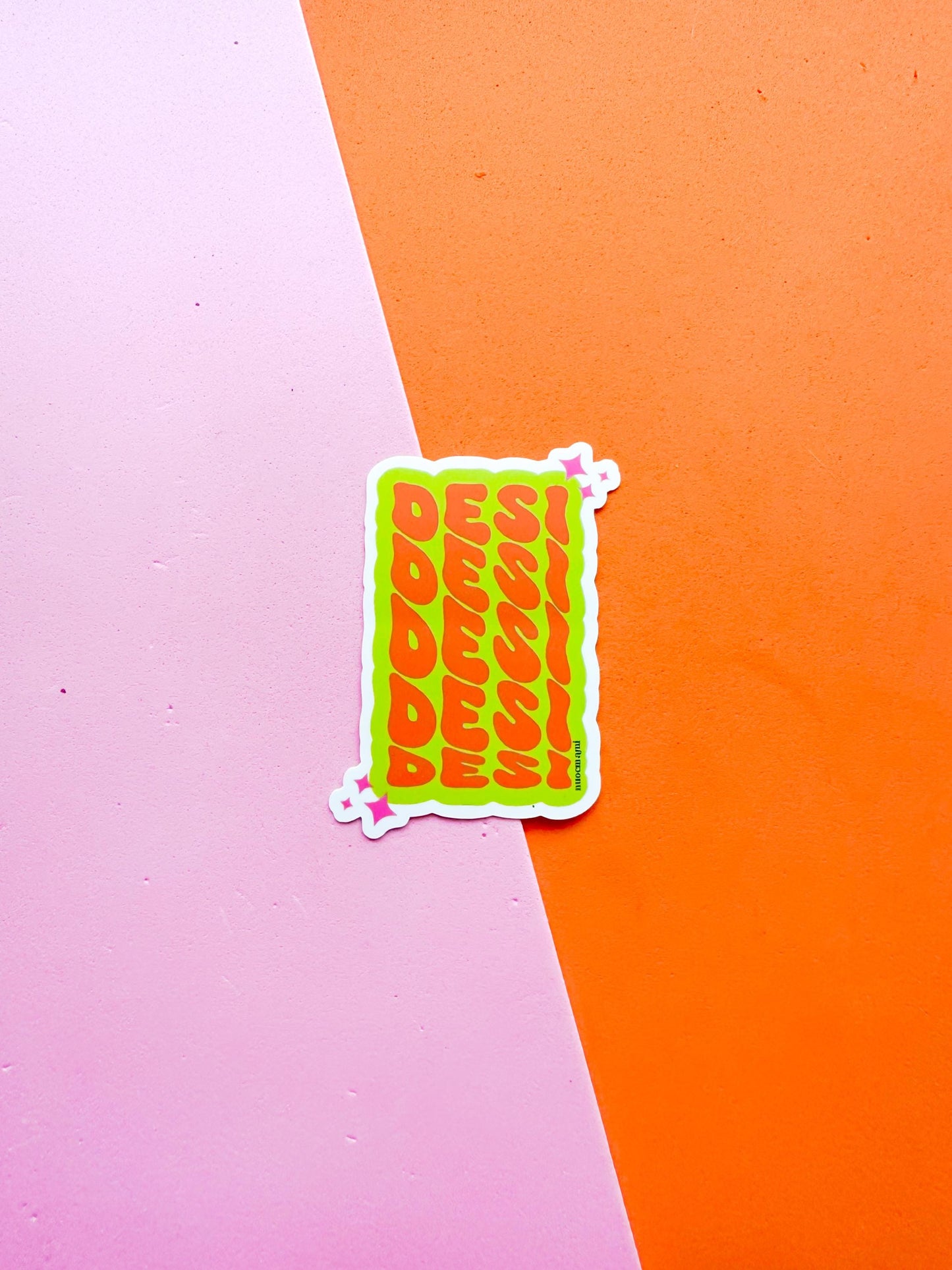 A matte premium vinyl sticker with the word 'DESI'