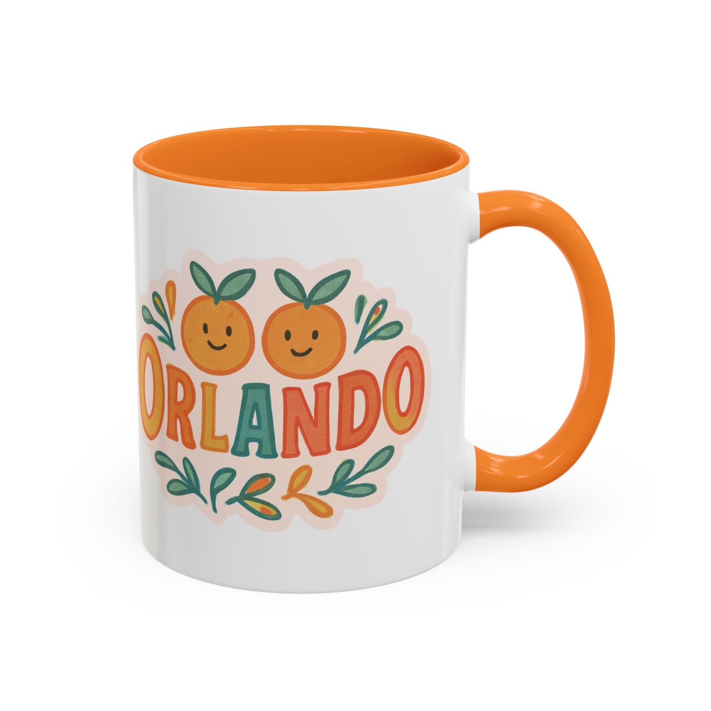 white ceramic mug with 'Orlando' written in orange lettering, accompanied by a graphic of orange and green leaves. The mug has an orange interior and handle.