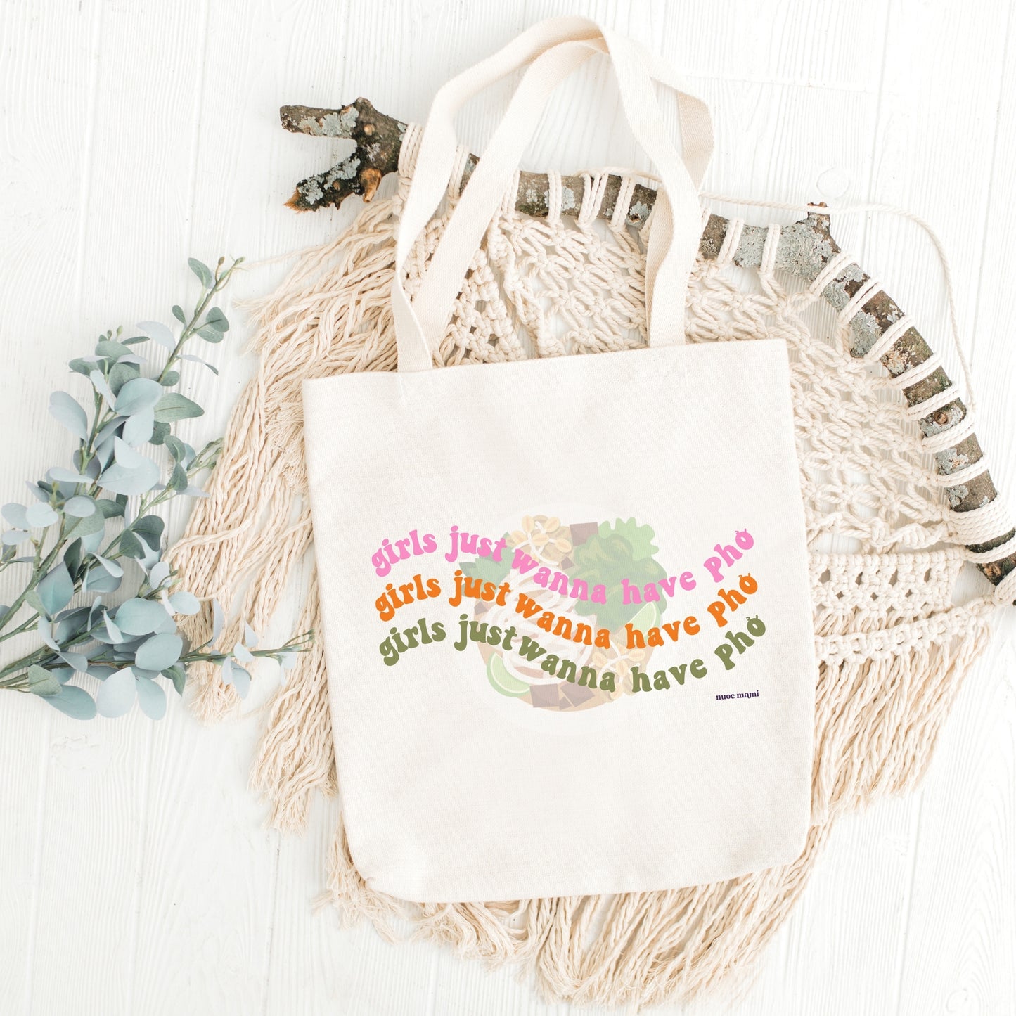 Canvas tote bag with the text 'Girls just wanna have Pho' printed on the front,  