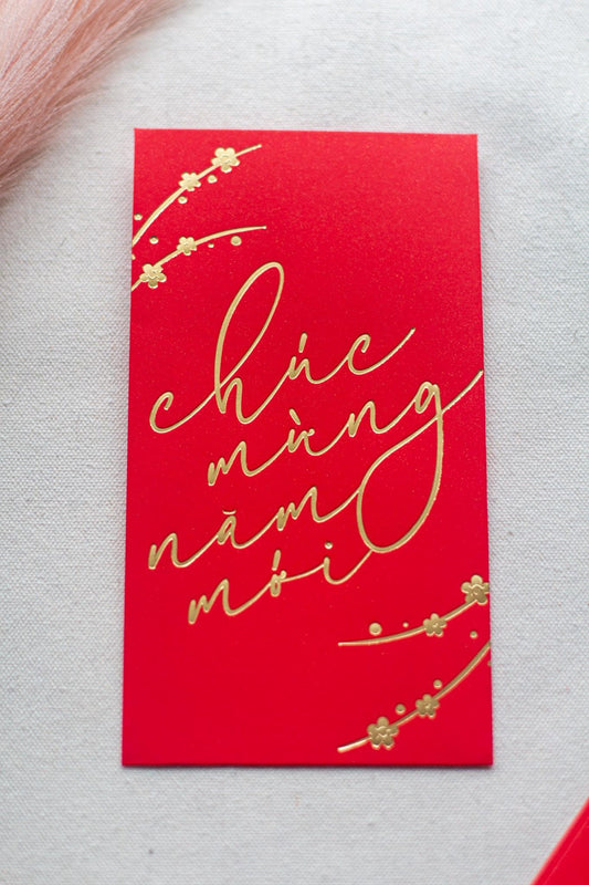 A vibrant red envelope with gold foil accents and text that translates to 'May you be prosperous this new year' in Vietnamese.

Lunar New Year Envelopes, Vietnamese Lucky Red Envelopes, Bao Li Xi, Hongbao, Chuc Mung Nam Moi Envelopes, Lunar New Year Tet 2025 Envelopes