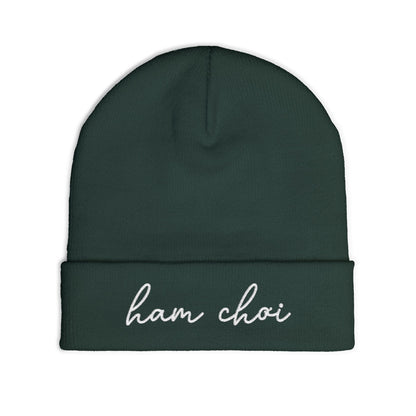 Dark green beanie with 'ham choi' embroidered on a white background