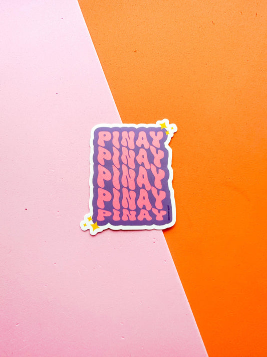 A vinyl sticker with the text 'PINAY PINOY' 
