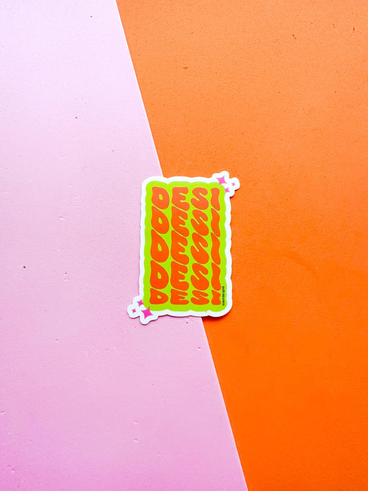 A matte premium vinyl sticker with the word 'DESI' 