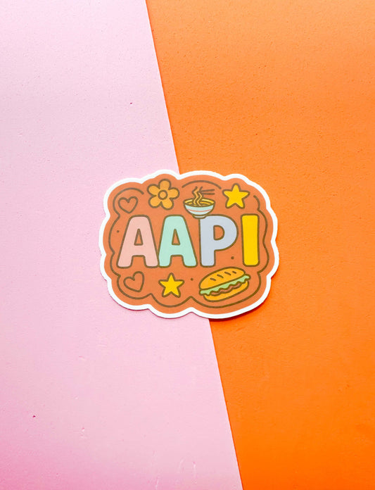 A matte premium vinyl sticker with the text 'AAPI'