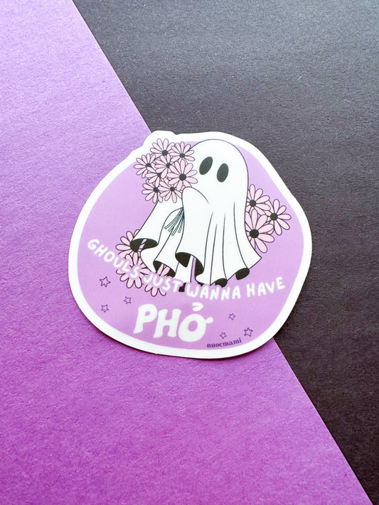 Sticker with a ghost and flowers on a purple and black background. Ghouls Just Wanna Have Pho.
