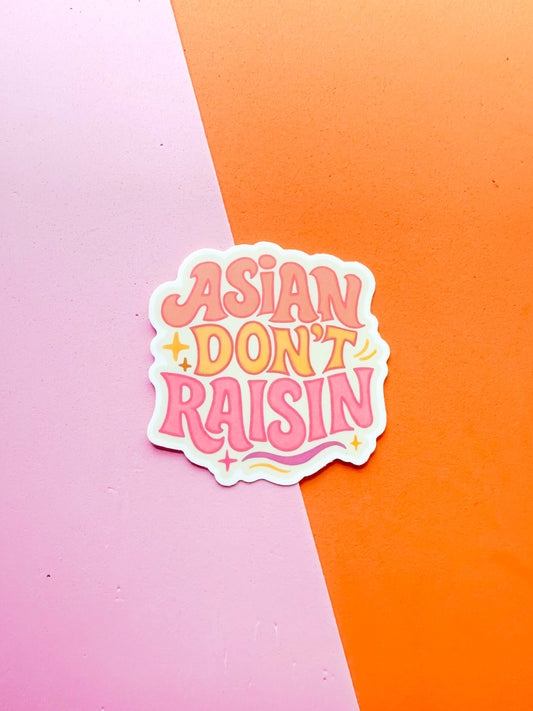 A vinyl sticker with the phrase 'ASIAN DON'T RAISIN' 
