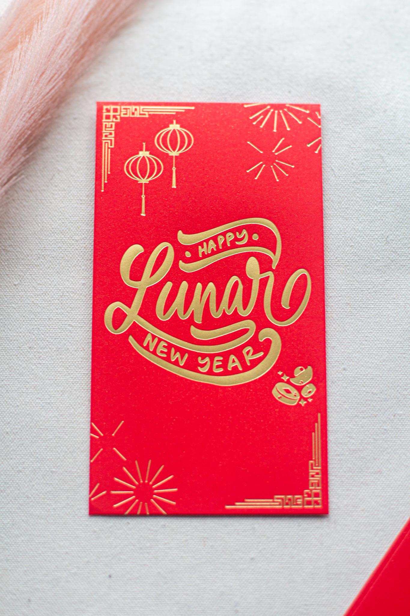 A vibrant red envelope with gold foil accents and text that translates to 'May you be prosperous this new year' in Vietnamese.

Lunar New Year Envelopes, Vietnamese Lucky Red Envelopes, Bao Li Xi, Hongbao, Chuc Mung Nam Moi Envelopes, Lunar New Year Tet 2025 Envelopes