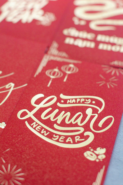 A vibrant red envelope with gold foil accents and text that translates to 'May you be prosperous this new year' in Vietnamese.

Lunar New Year Envelopes, Vietnamese Lucky Red Envelopes, Bao Li Xi, Hongbao, Chuc Mung Nam Moi Envelopes, Lunar New Year Tet 2025 Envelopes