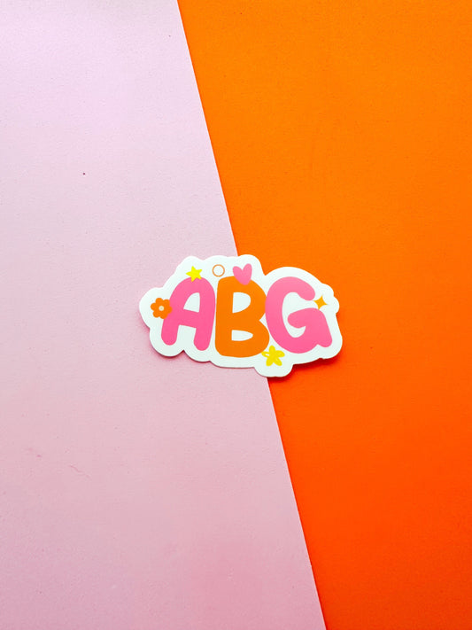 A vinyl sticker with the text 'ABG' and the phrase 'Asian Baby Girl' in stylized font 